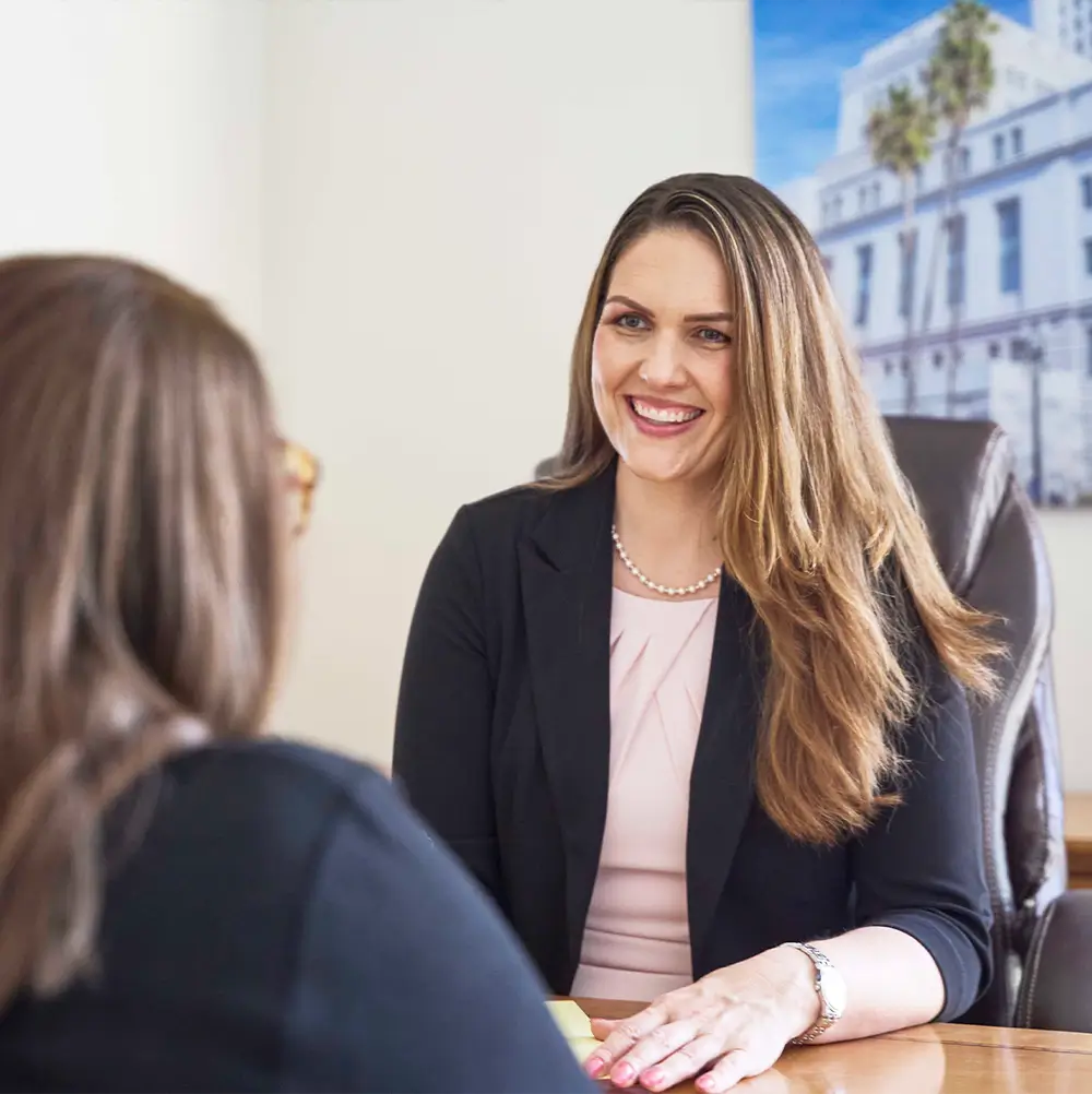 julie-j-villalobos-client Oak Tree Law personal injury attorney Julie J. Villalobos with a client
